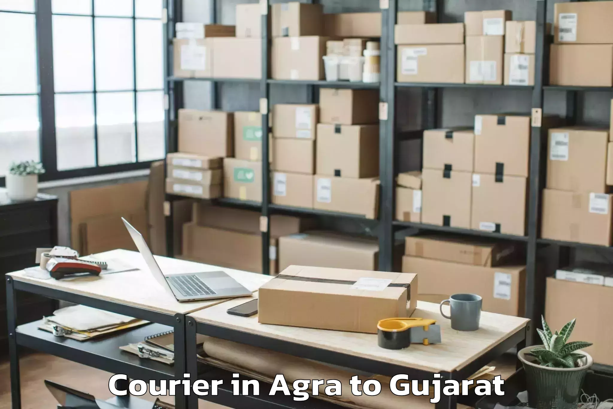 Get Agra to Dhanera Courier